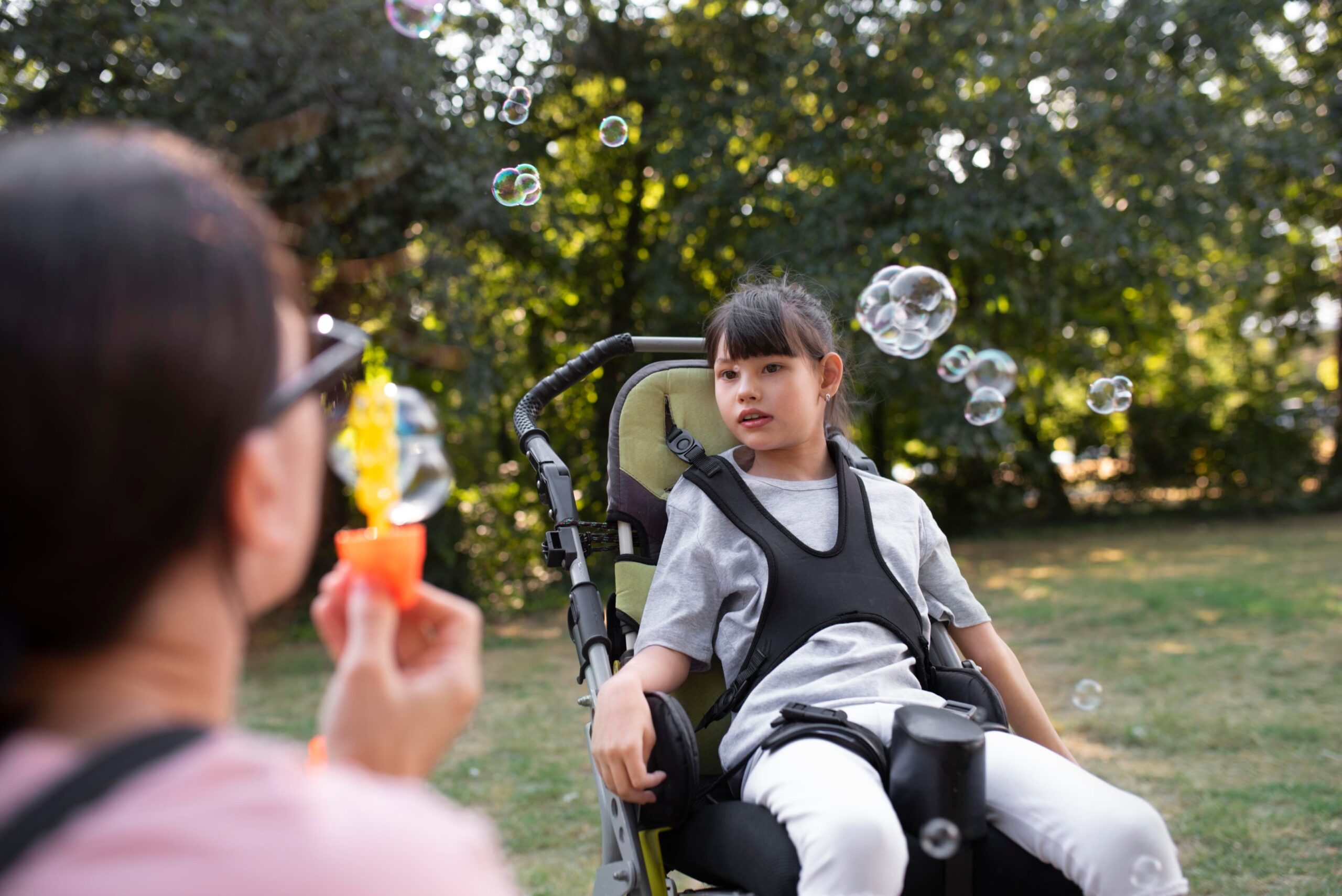 Child using Assistive Technology in Occupational Therapy session